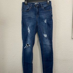 Dark blue ripped jeans